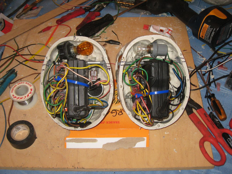 Illustration for article titled Make Your Own Animatronic Screaming Skull Brake Lights With Junkyard Parts!